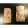 7 x 13 cm. 25 Bolsas de papel kraft estampadas con soles, lunas y estrellas. Mil usos.
